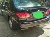 Cần bán gấp Toyota Corolla altis sản xuất năm 2002, màu đen xe gia đình