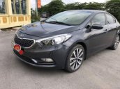 Cần bán lại xe Kia K3 2015, màu đen còn mới, giá 520tr