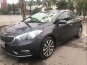 Cần bán lại xe Kia K3 2015, màu đen còn mới, giá 520tr