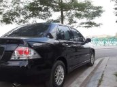 Cần bán xe Mitsubishi Lancer đời 2004, màu đen