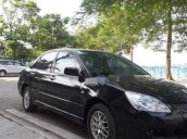 Cần bán xe Mitsubishi Lancer đời 2004, màu đen