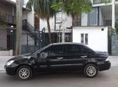 Cần bán xe Mitsubishi Lancer đời 2004, màu đen
