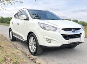 Cần tiền mua đất nên bán xe Hyundai Tucson 2.0 AT 4WD đời 2013, màu trắng, nhập khẩu nguyên chiếc chính chủ, 599tr