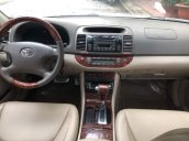 Cần bán Toyota Camry 3.0 sản xuất 2002, màu ghi hồng, odo 95.000km, số tự động