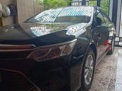 Bán xe Toyota Camry 2016, màu đen đã đi 31000km, giá chỉ 900 triệu