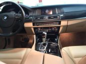 Bán BMW 520i màu xanh/kem, sản xuất 12/2014, đăng ký biển Hà Nội