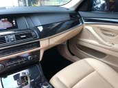 Bán BMW 520i màu xanh/kem, sản xuất 12/2014, đăng ký biển Hà Nội