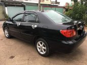 Bán Toyota Corolla altis 1.8G MT đời 2003, màu đen số sàn, giá chỉ 243 triệu