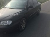 Cần bán lại xe Kia Spectra đời 2005, màu đen