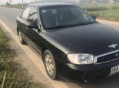 Cần bán lại xe Kia Spectra đời 2005, màu đen