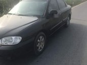 Cần bán lại xe Kia Spectra đời 2005, màu đen