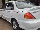 Cần bán gấp Kia Spectra đời 2004, màu trắng, xe nhập chính chủ