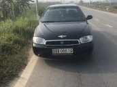 Cần bán lại xe Kia Spectra đời 2005, màu đen