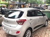 Cần bán Hyundai Grand i10 1.2 AT 2015, màu bạc, xe nhập