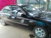 Bán xe Kia Spectra đời 2006, màu đen, xe nhập xe gia đình