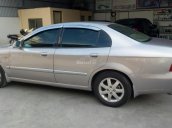 Cần bán lại xe Daewoo Magnus, số sàn, 2002 chính chủ màu bạc, 117tr