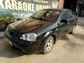 Cần bán gấp Chevrolet Lacetti sản xuất 2004, màu đen