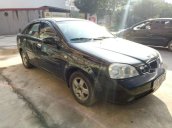 Cần bán gấp Chevrolet Lacetti sản xuất 2004, màu đen