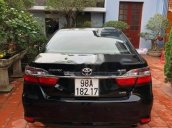 Cần bán Toyota Camry 2.0 E đời 2016, màu đen, giá 900tr