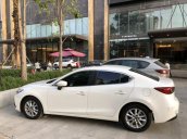 Cần bán Mazda 3 1.5 AT sản xuất 2015, màu trắng chính chủ