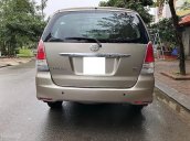 Gia đình cần bán Toyota Innova G 2012 số sàn, màu vàng cát