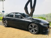 Bán ô tô BMW 3 Series 320i đời 2013, màu đen, xe nhập