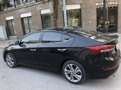 Cần bán xe Hyundai Elantra 2.0AT năm 2017, màu đen như mới
