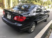 Bán Toyota Corolla J 1.3 MT đời 2003, màu đen như mới