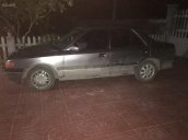 Cần bán gấp Mazda 323 sản xuất 1995 màu xám (ghi), giá tốt, xe nhập