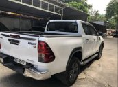 Bán Toyota Hilux 2015 số tự động, 2 cầu, đăng ký T11/2015, form mới