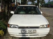 Bán Mazda 323 sản xuất 1995, xe đang đi bình thường, còn hạn đăng kiểm