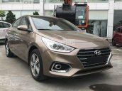 Hyundai Accent AT TC màu vàng cát, xe giao ngay, tặng bộ phụ kiện có giá trị, hỗ trợ vay lãi suất ưu đãi. LH: 0903175312