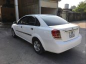 Cần bán Daewoo Lacetti năm sản xuất 2004, màu trắng, nhập khẩu nguyên chiếc xe gia đình