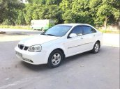 Cần bán Daewoo Lacetti năm sản xuất 2004, màu trắng, nhập khẩu nguyên chiếc xe gia đình