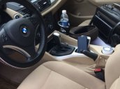 Chính chủ bán ô tô BMW X1 3.0 AT sản xuất năm 2011, màu nâu