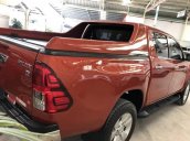 Cần bán Toyota Hilux 2.8AT sản xuất năm 2016, màu cam  