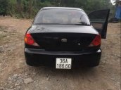 Bán Kia Spectra MT đời 2004, màu đen, xe đẹp