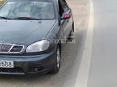 Bán Daewoo Lanos màu đen, đời 2001, xe đang chạy bình thường, gia đình đang sử dụng