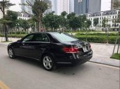 Bán xe Mercedes E200 2014, màu đen còn mới