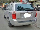 Cần bán Kia Carnival đời 2009, màu bạc, xe chính chủ rất đẹp