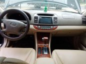 Bán Toyota Camry năm 2004, màu đen như mới