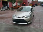 Bán xe Toyota Vios E năm sản xuất 2014, màu vàng cát