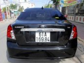 Tôi cần bán xe Daewoo Lacetti dòng cao cấp EX 1.6 rất kinh tế, số sàn, màu đen