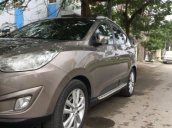 Cần bán xe Hyundai Tucson 2.0 AT sản xuất 2010, màu xám