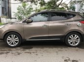 Cần bán xe Hyundai Tucson 2.0 AT sản xuất 2010, màu xám