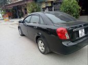 Gia đình bán xe Daewoo Lacetti đời 2010, màu đen