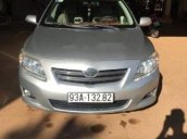 Cần bán gấp Toyota Corolla Altis đời 2009, màu bạc xe gia đình