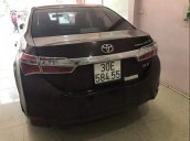 Bán Toyota Corolla altis 1.8G sản xuất năm 2015, màu nâu chính chủ