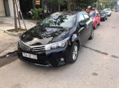 Chính chủ bán Toyota Corolla altis 2015, màu đen, xe nhập