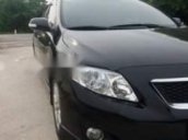 Gia đình bán xe Toyota Corolla altis 2010, màu đen  